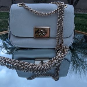 Open box, crossbody coach purse with matching wall